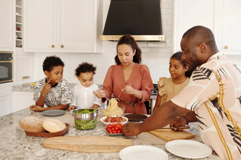 family gathering around large pizza table